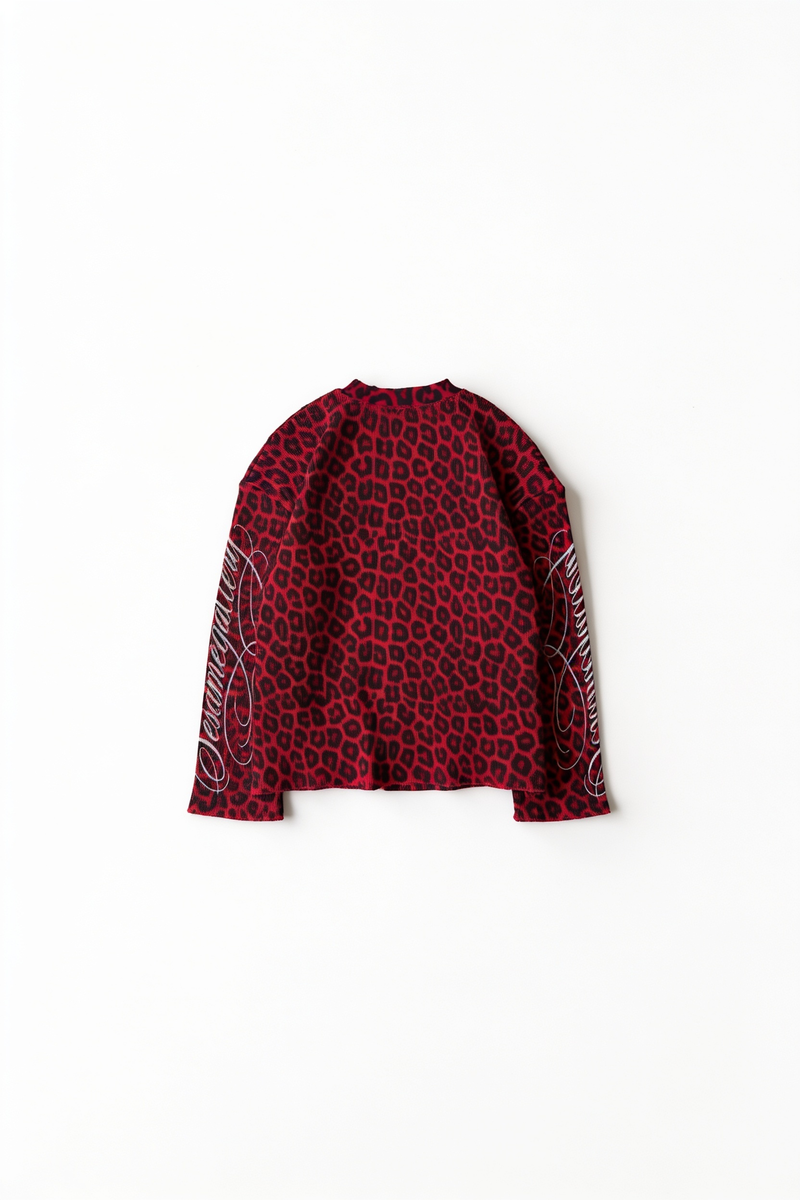 Röd långärmad leopardtopp med grafik